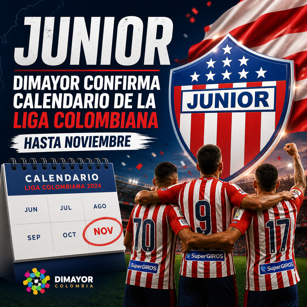 Jugadores de Junior de Barranquilla celebran junto al escudo del equipo por el calendario de la Liga colombiana.